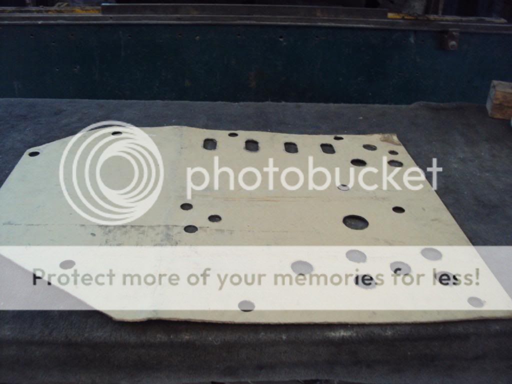 Holes in skid plates for belt change???? CanAm Commander Forum